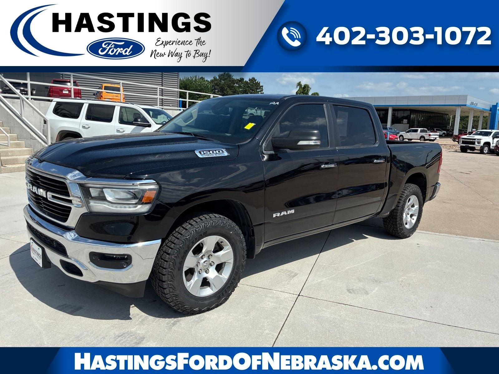 2019 RAM 1500 Big Horn/Lone Star in Diamond Black Crystal Pearlcoat — front three-quarter view