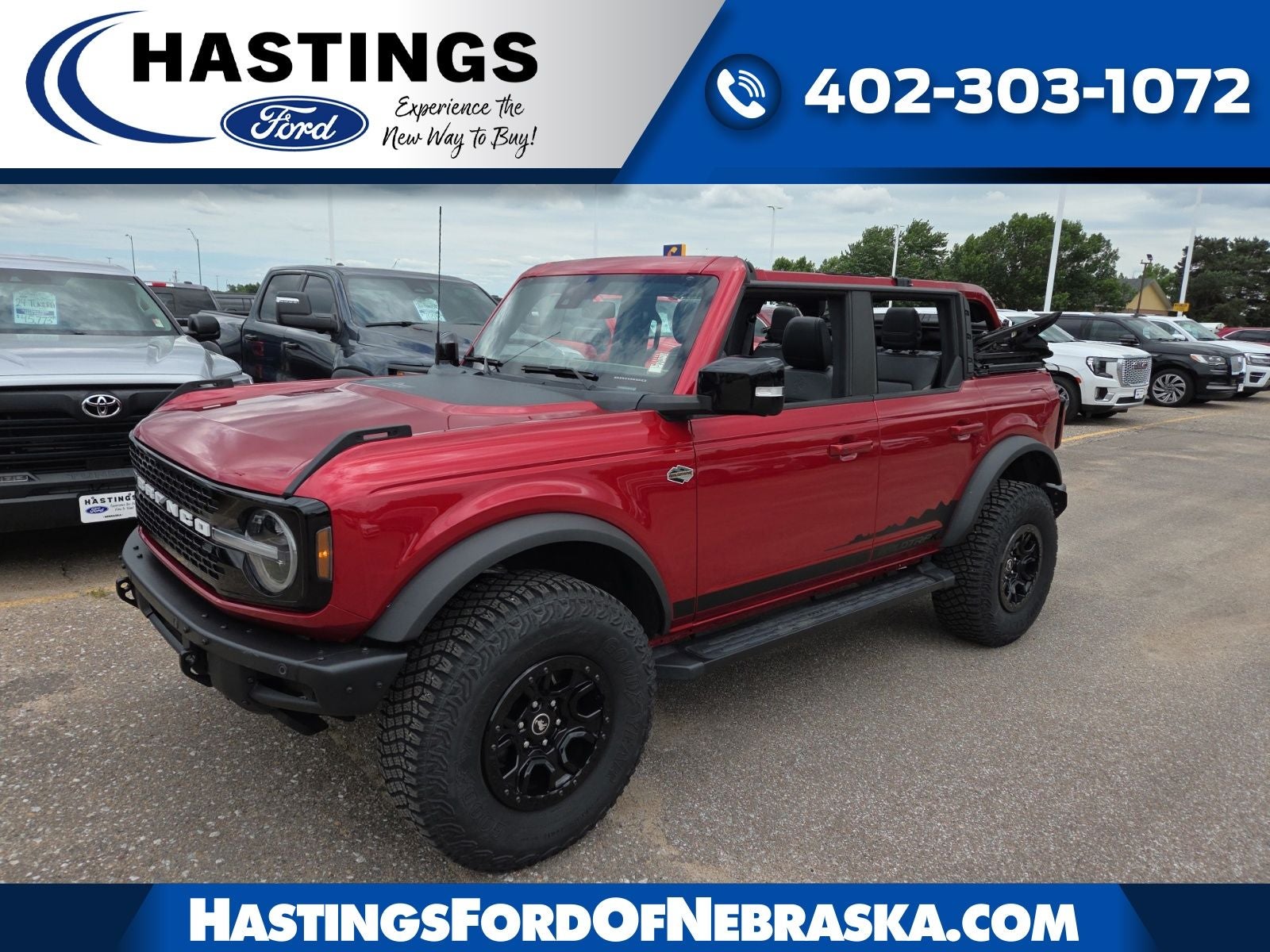 2021 Ford Bronco Wildtrak 353A in Red Metallic — front three-quarter view
