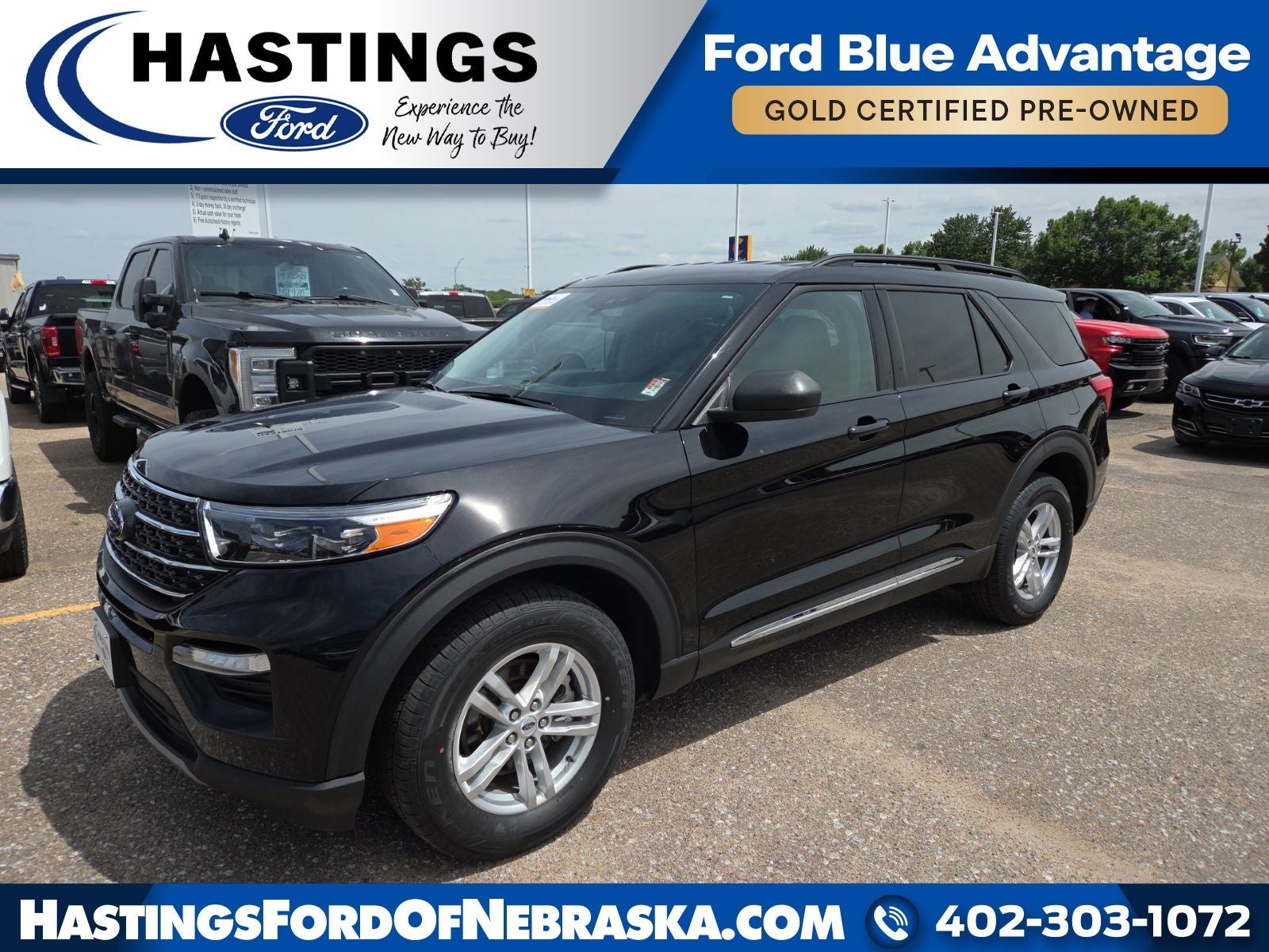 2023 Ford Explorer XLT 202A in Black Metallic — front three-quarter view