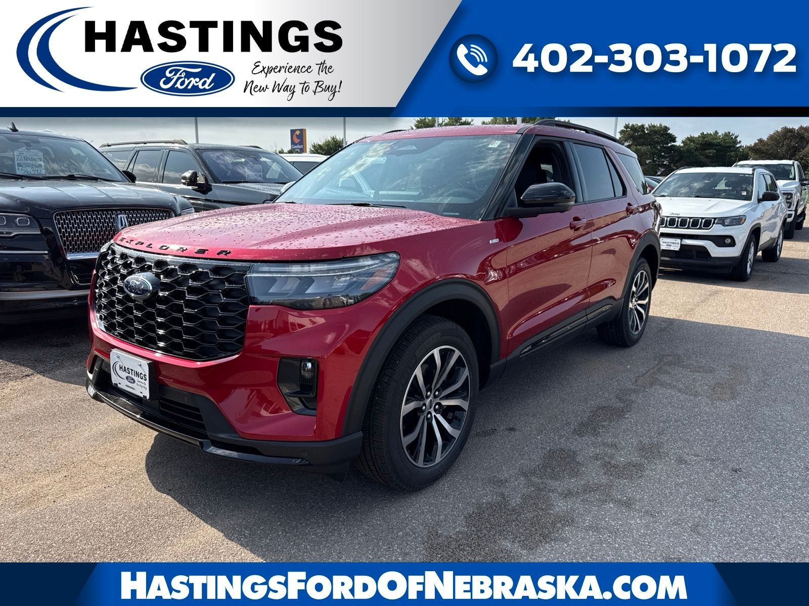 2026 Ford Explorer ST-Line in Rapid Red Metallic Tinted Clearcoat — front three-quarter view