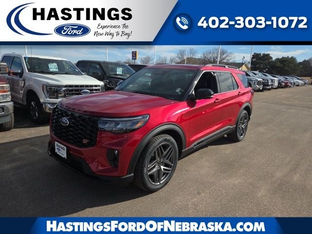 2026 Ford Explorer ST in Rapid Red Metallic Tinted Clearcoat — front three-quarter view