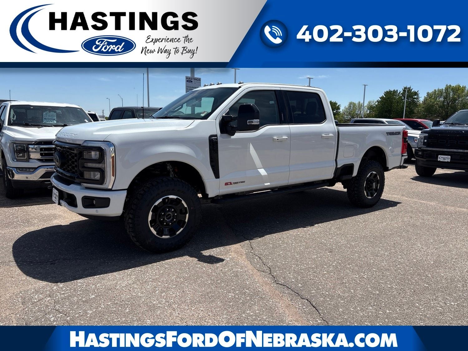 2026 Ford F-250SD Lariat in Star White Metallic Tri-Coat — front three-quarter view