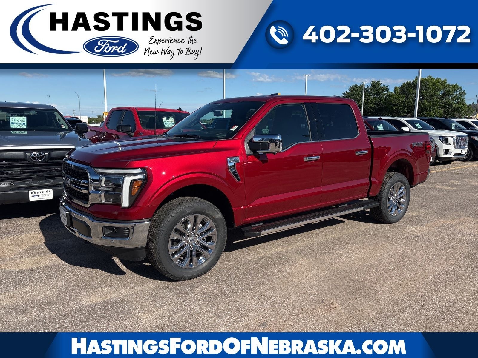 2026 Ford F-150 Lariat in Ruby Red Metallic Tinted Clearcoat — front three-quarter view