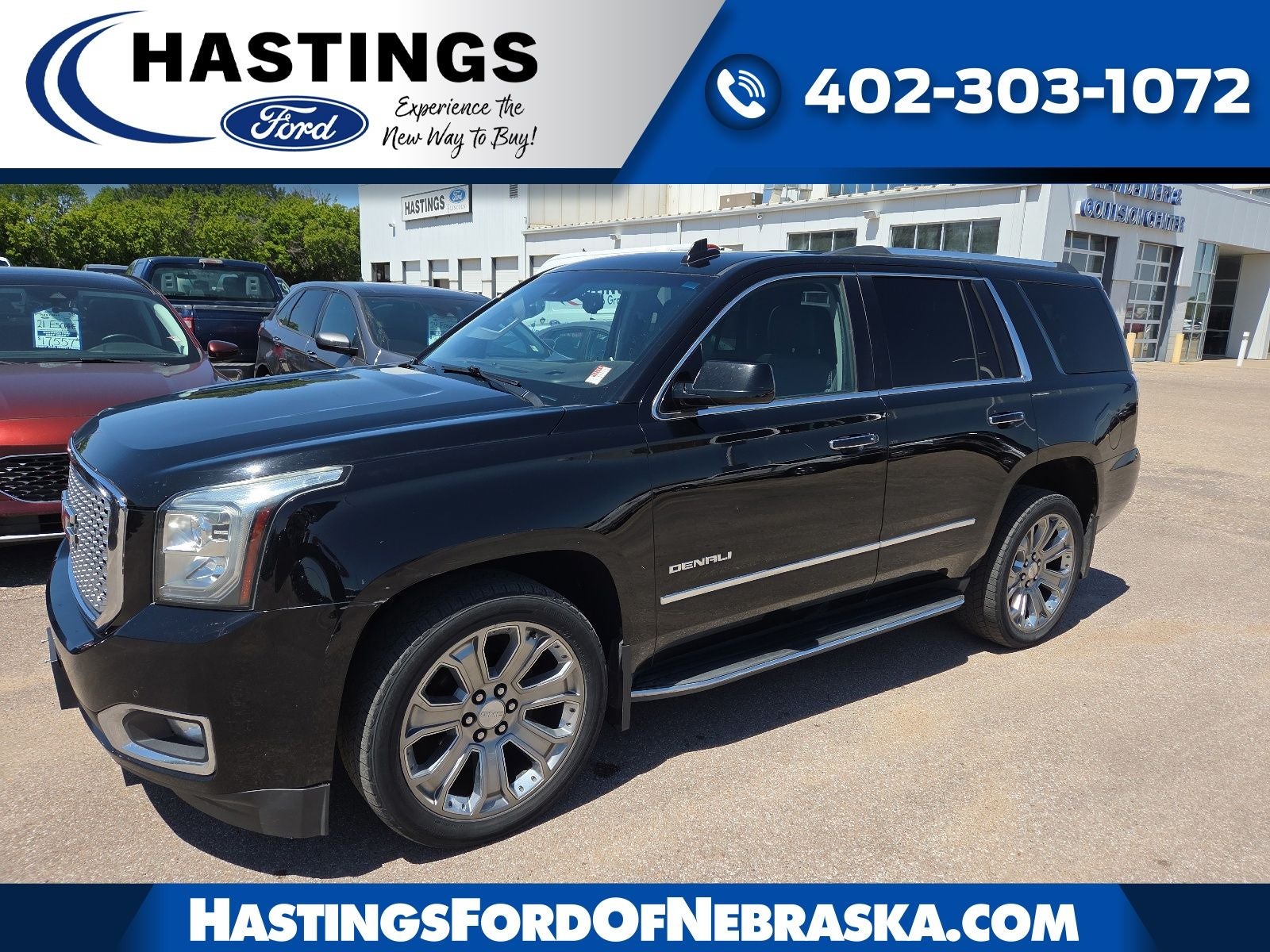 2016 GMC Yukon Denali 5SA in Onyx Black — front three-quarter view