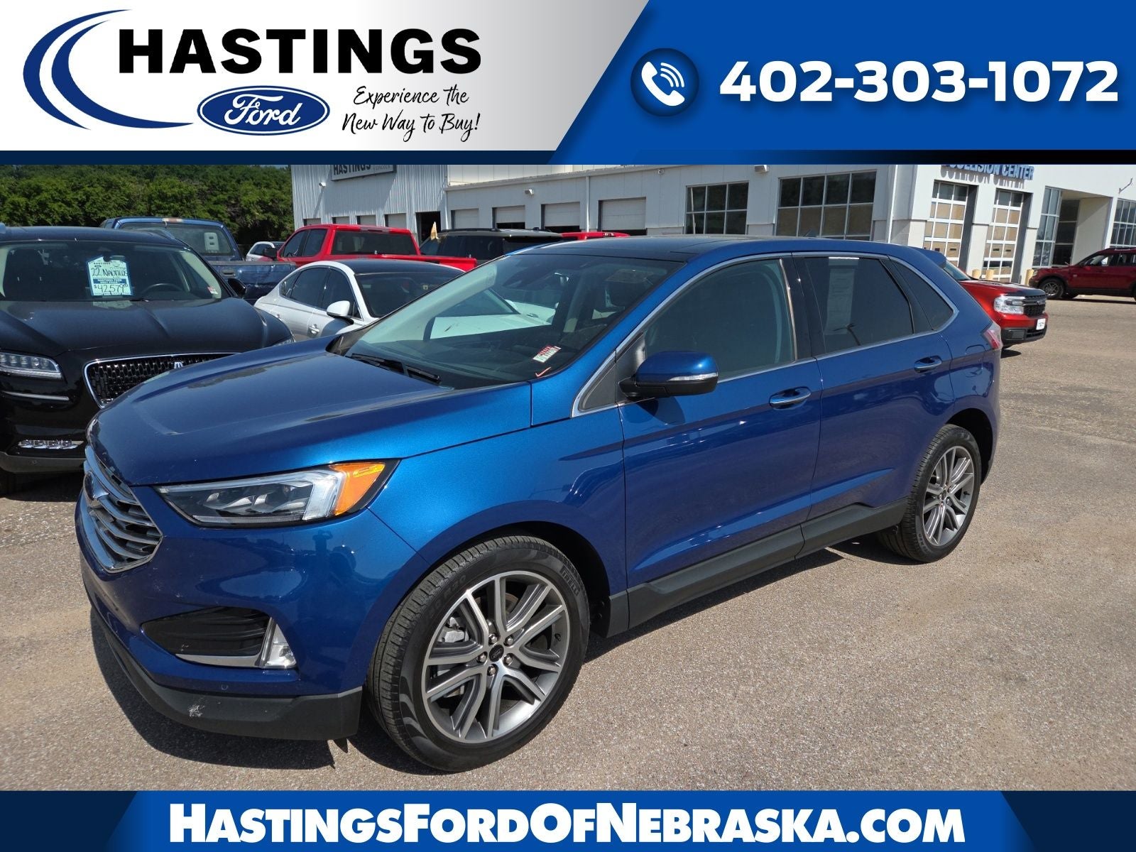 2024 Ford Edge Titanium 301A in Atlas Blue Metallic — front three-quarter view