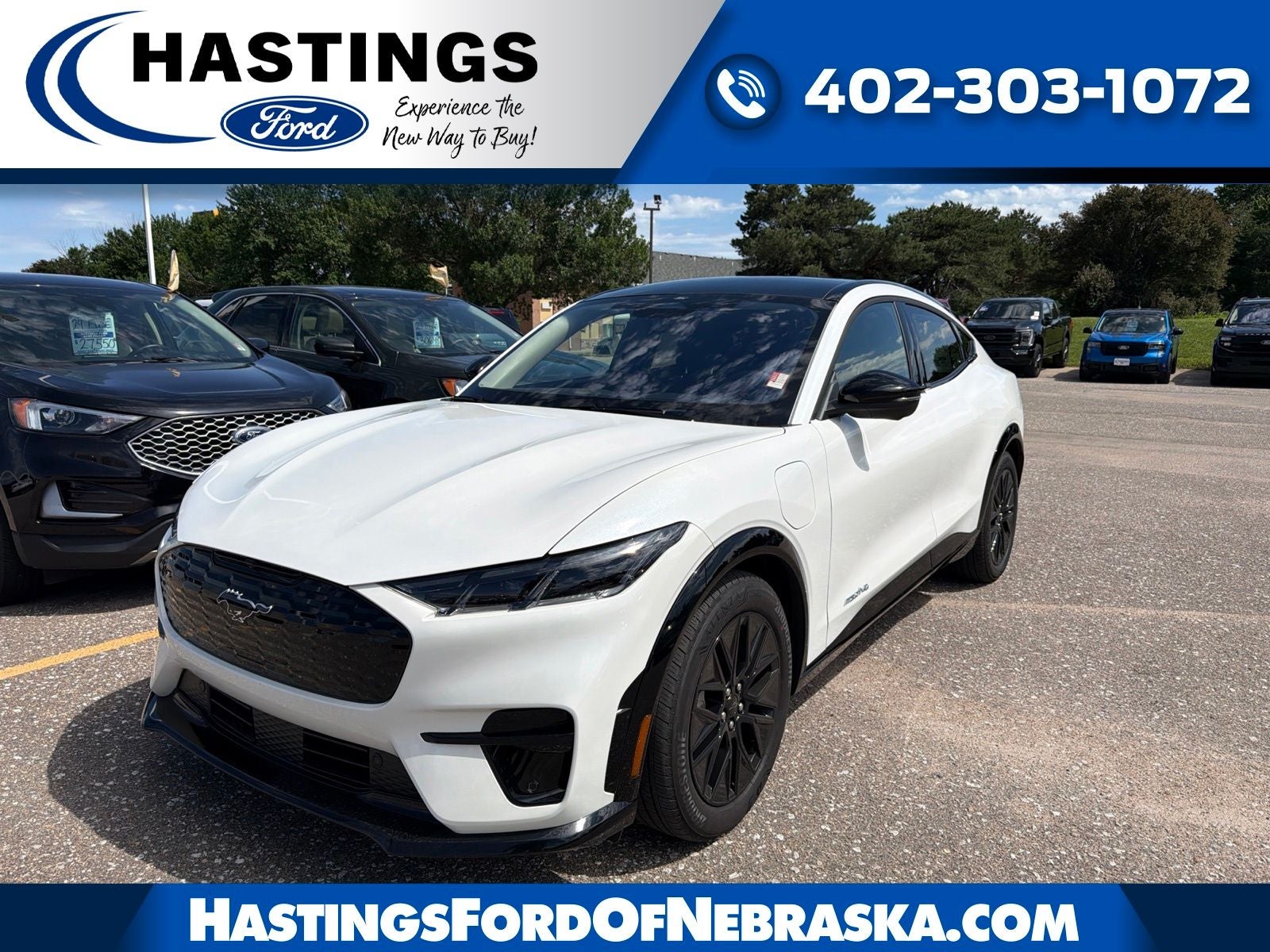 2026 Ford Mustang Mach-E Premium in Star White Metallic Tri-Coat — front three-quarter view