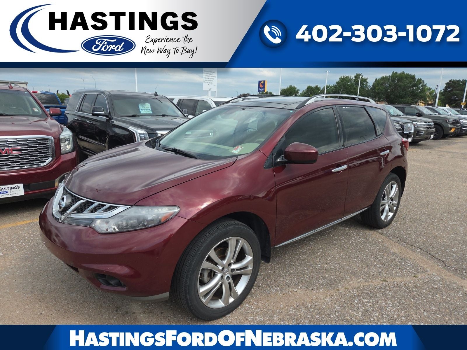 2011 Nissan Murano LE in Merlot Metallic — front three-quarter view